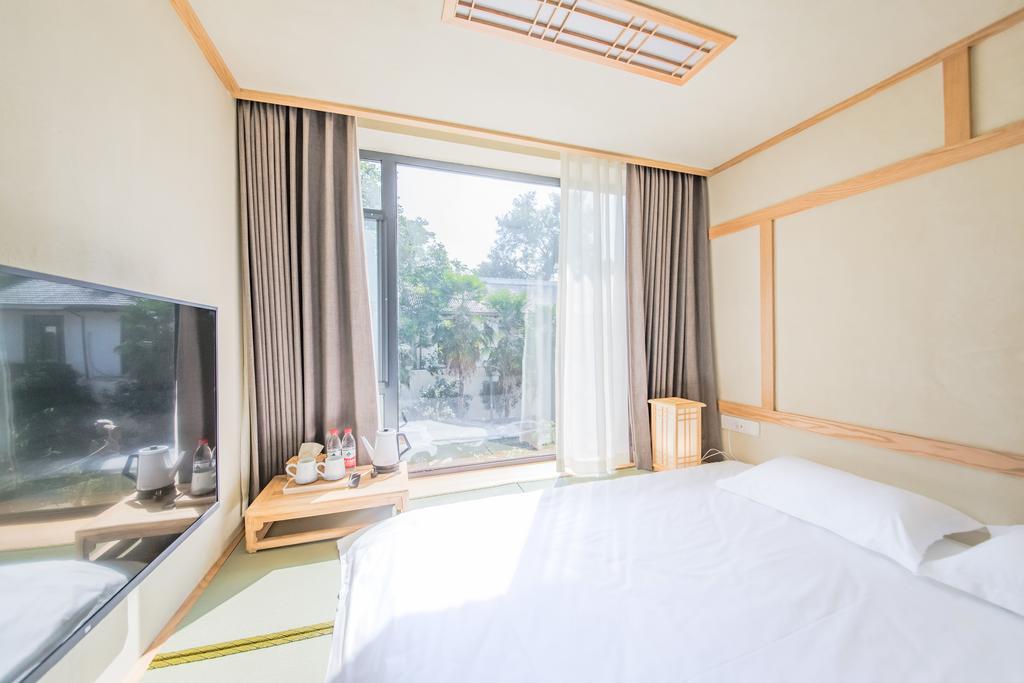 Hangzhou Van Wind Inn Buitenkant foto