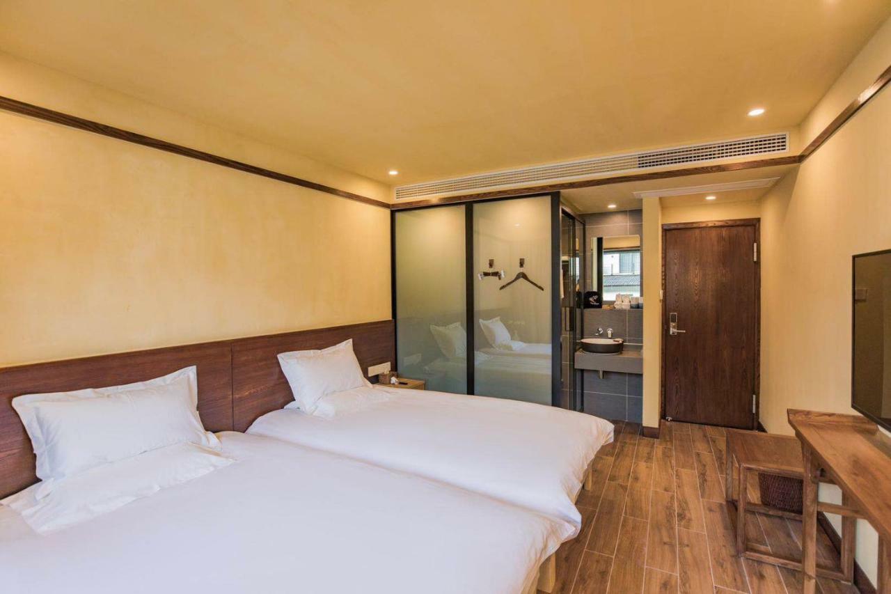 Hangzhou Van Wind Inn Buitenkant foto