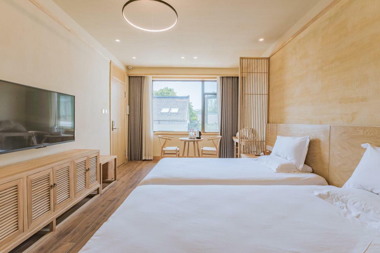 Hangzhou Van Wind Inn Buitenkant foto