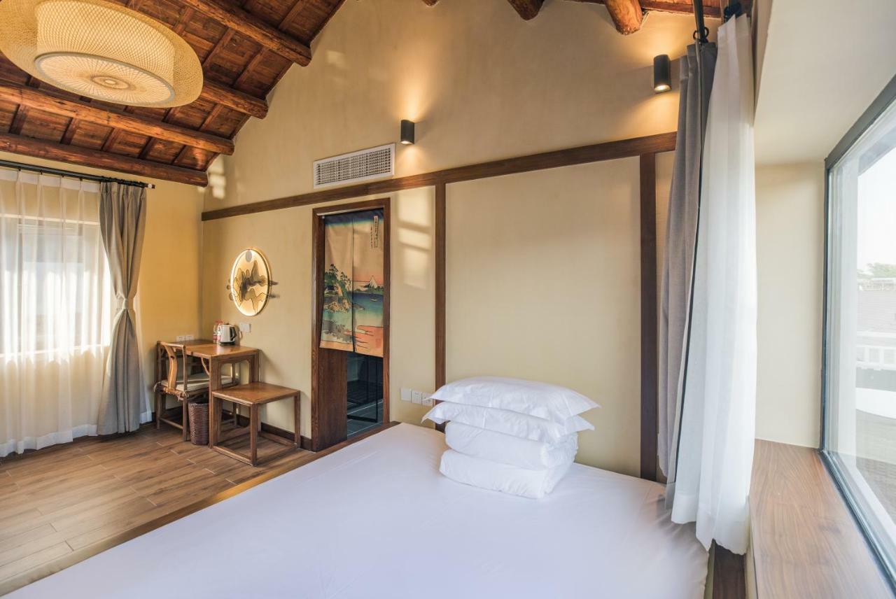 Hangzhou Van Wind Inn Buitenkant foto