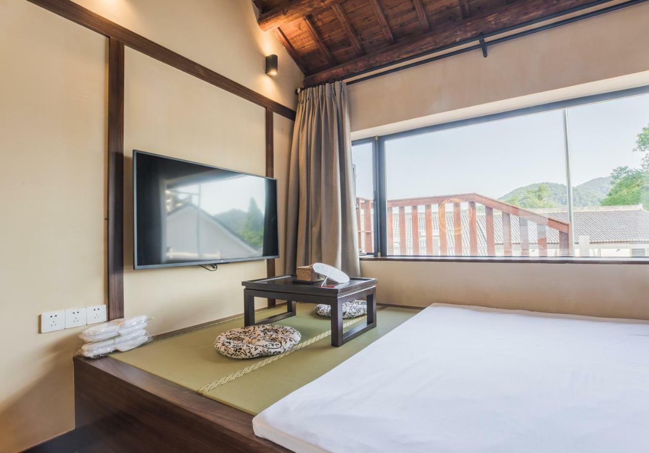 Hangzhou Van Wind Inn Buitenkant foto